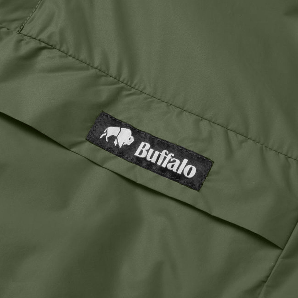 buffalo logo on systems olive green mountain shirt
