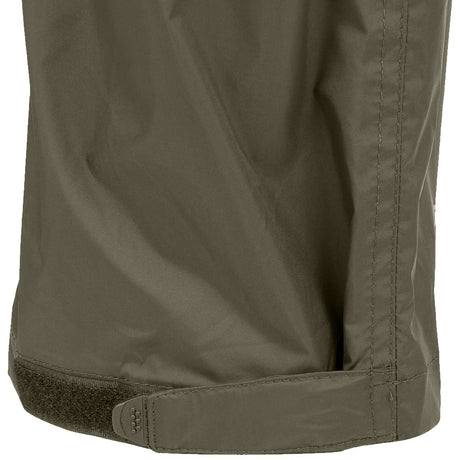 highlander ranger green stow and go waterproof trousers with velcro adjustable hems