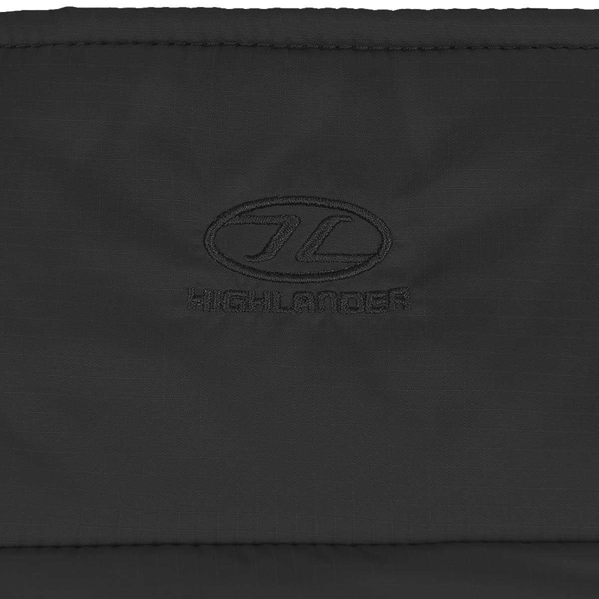 logo on collar of highlander rayder tactical black insulated jacket