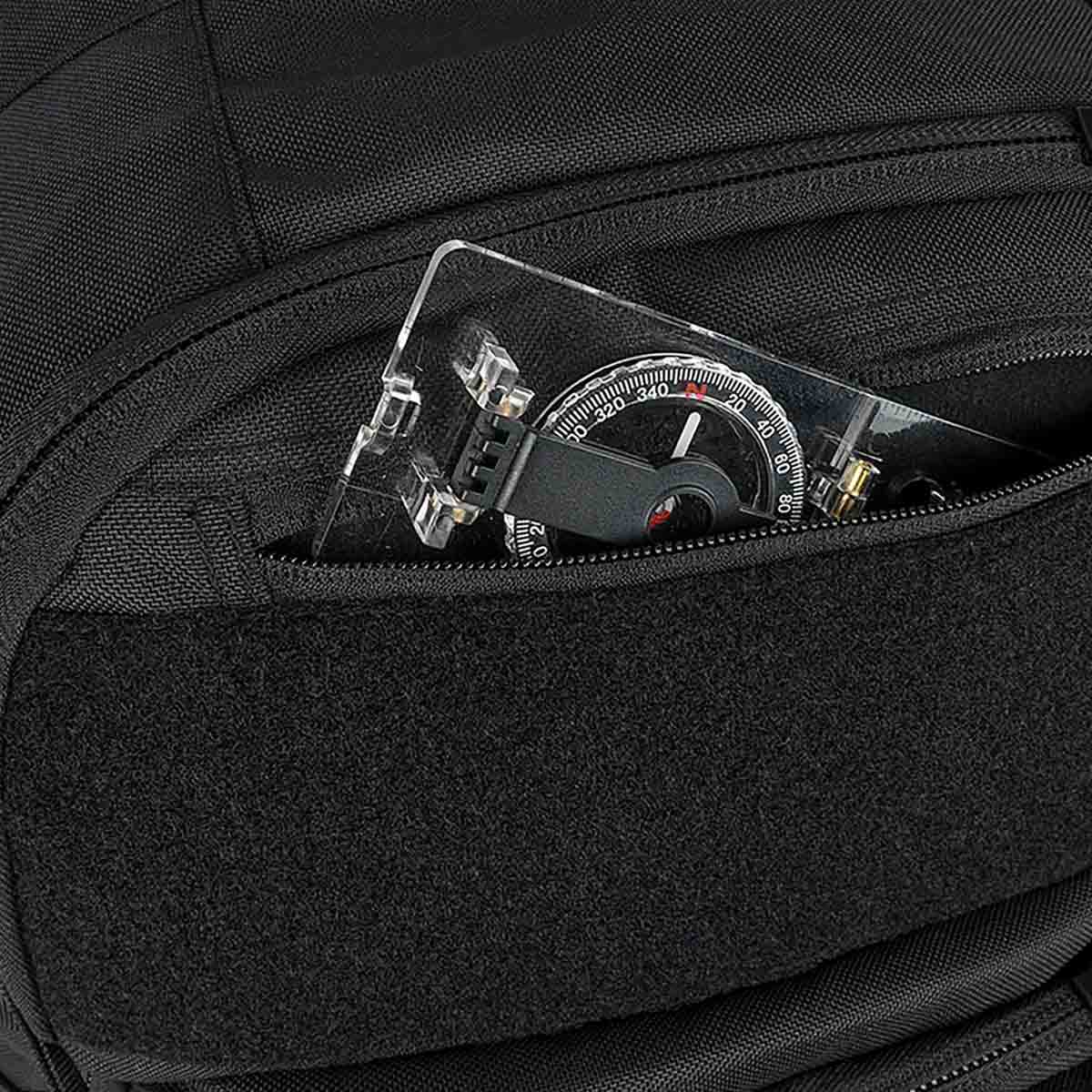 outer stash pocket of black highlander harrier full 45l clamshell pack