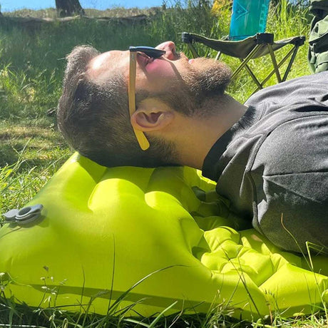 pillow being used on green dd hammocks superlight inflatable mat