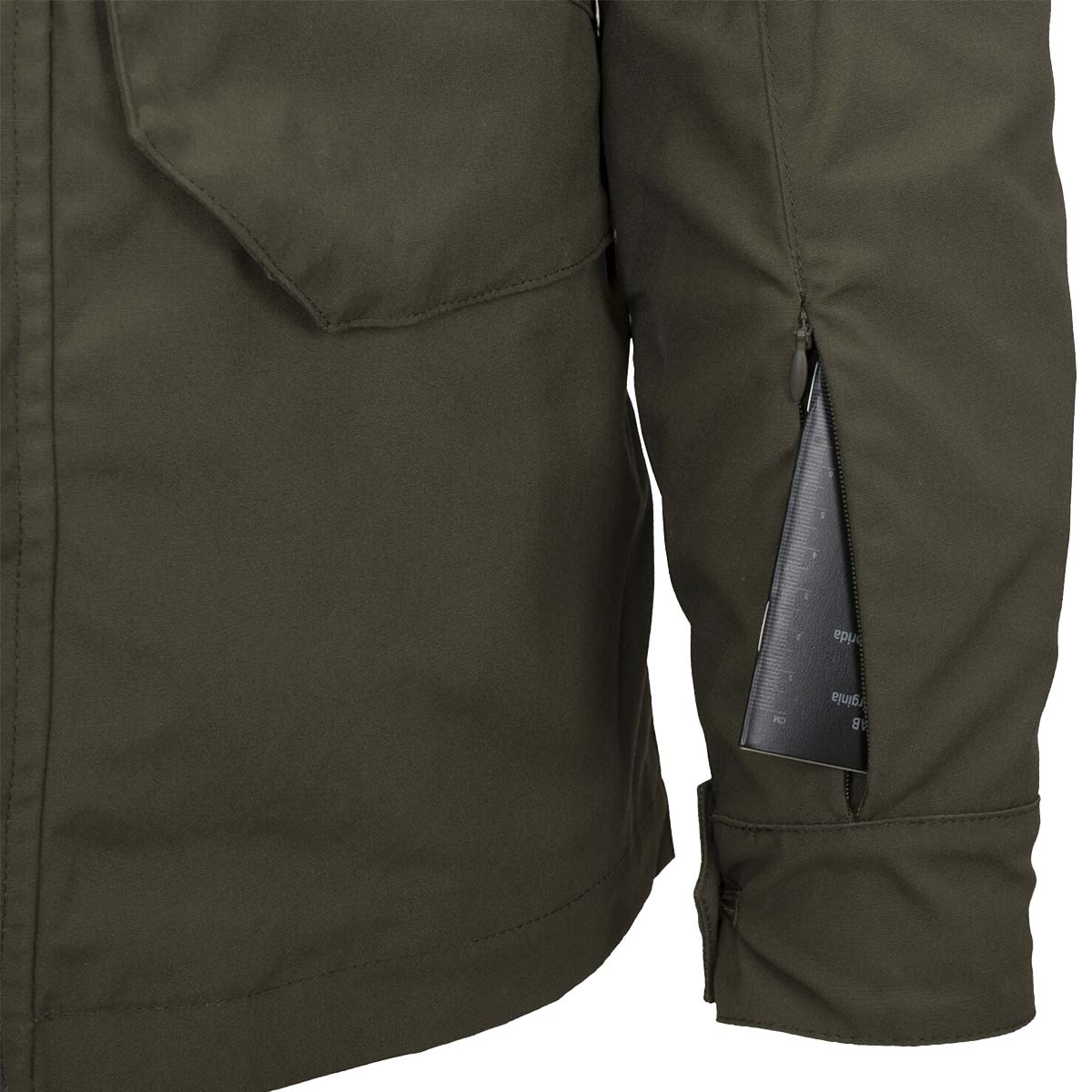 zipped pocket on helikon covert m65 taiga green jacket sleeve