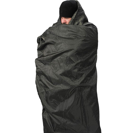 snugpak black wrapped around insulated blanket