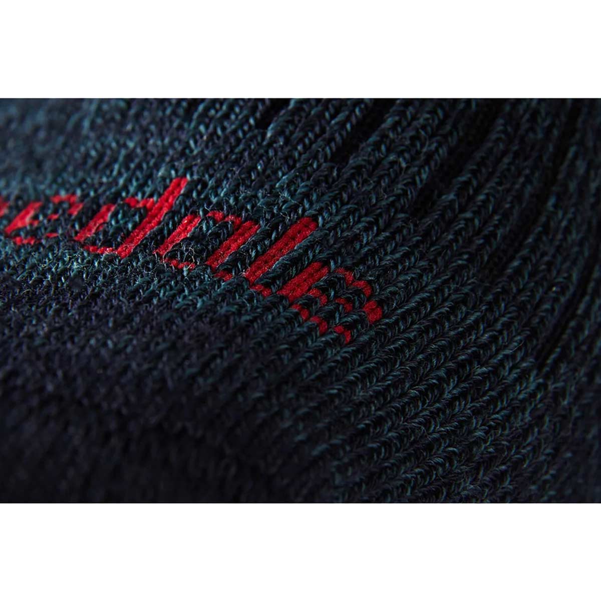 close up of fabric of bridgedale mens hike midweight merino comfort boot sock navy