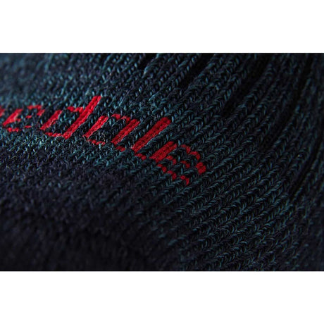 close up of fabric of bridgedale mens hike midweight merino comfort boot sock navy