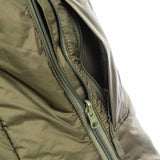 detail of hand and ventilation zip on olive tactical softie snugpak jacket