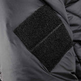 sj12 snugpak black insulated jacket with velcro sleeve patch