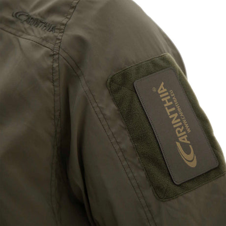 velcro sleeve patch on green carinthia lig 5.0 jacket