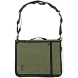 side view of olive snugpak a4 grab with handle